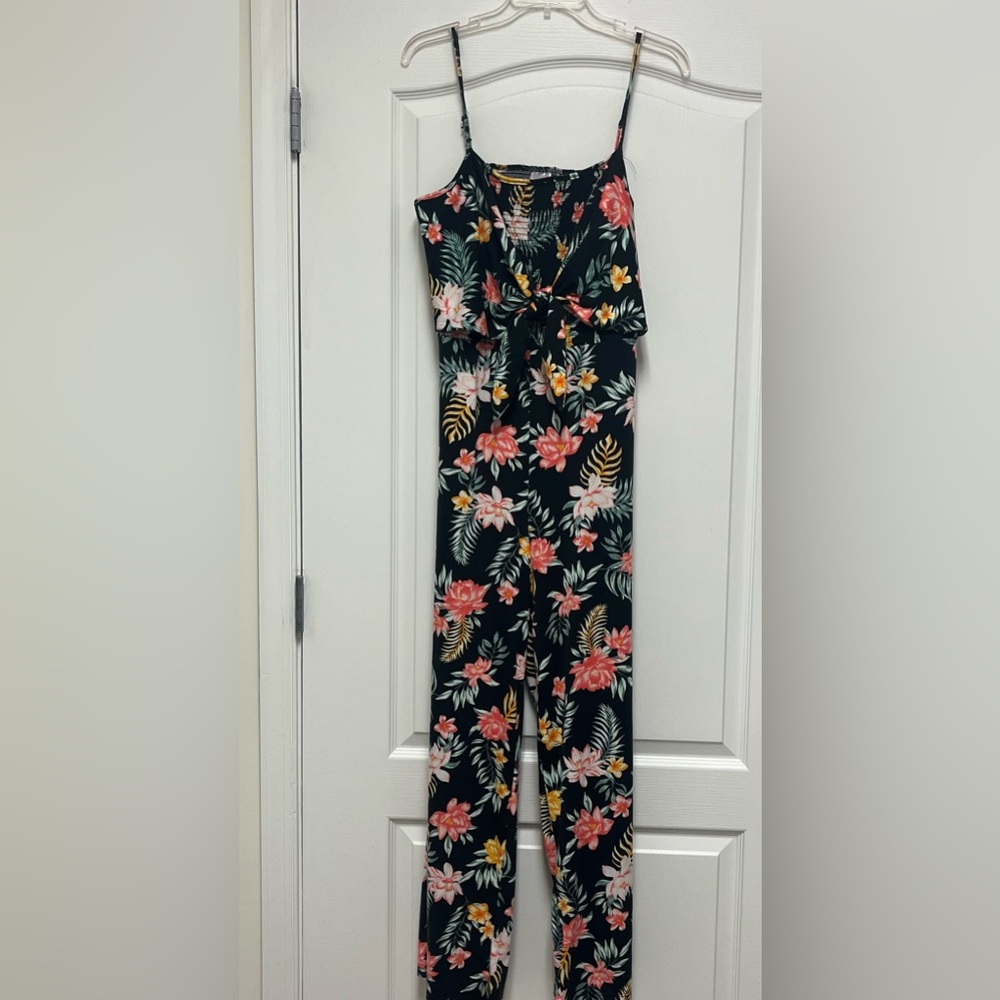 No Boundaries Spaghetti Strap Floral Jumpsuit with cutout back.